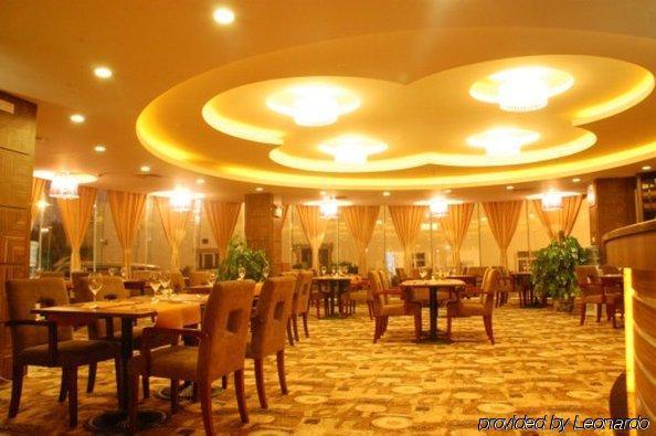 Foshan Xin Hu Hotel Ресторан фото